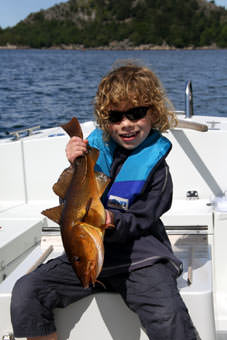 Farsund Resort - stolzer Jungangler